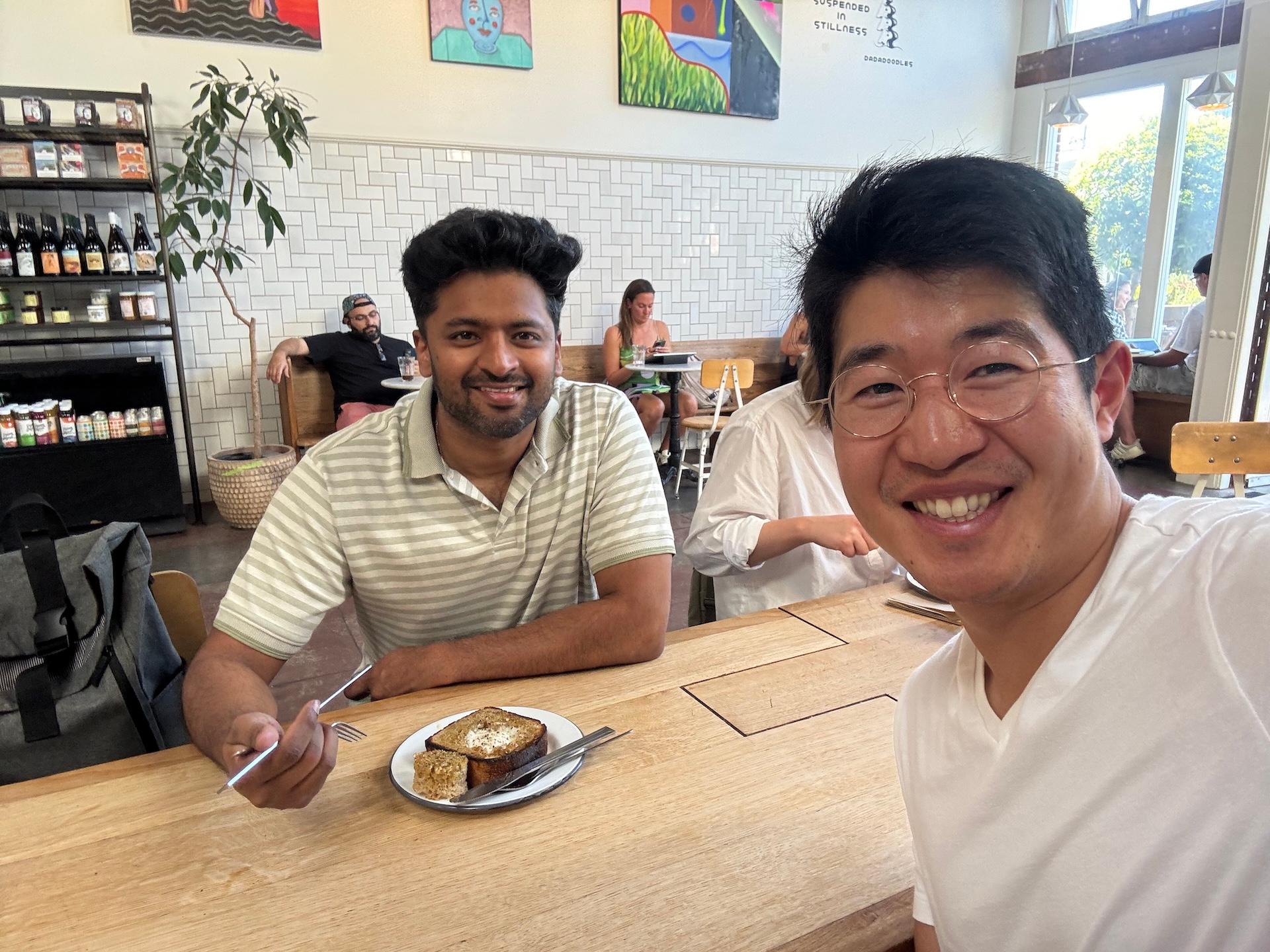 Ryo and Nik in a coffee shop in San Francisco