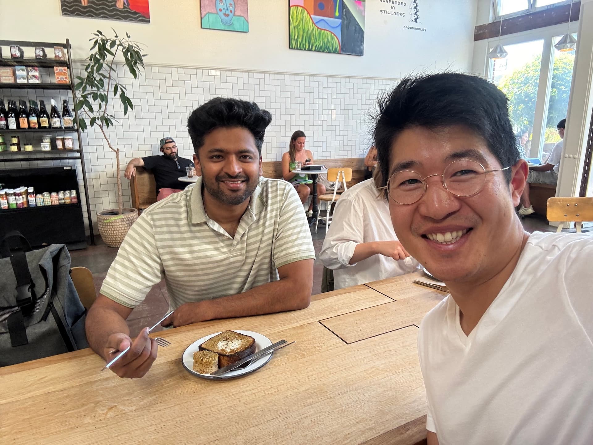 Ryo and Nik in a coffee shop in San Francisco